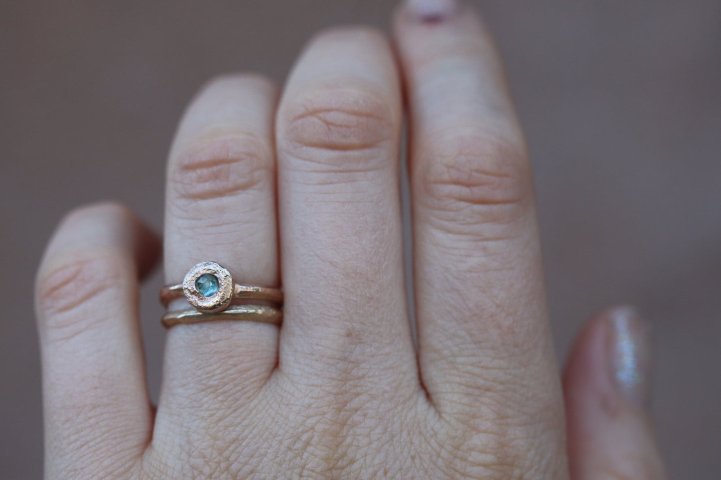 rustic organic sandcast solitaire ring alternative engagement 14kt recycled gold montana sapphire teal rosecut