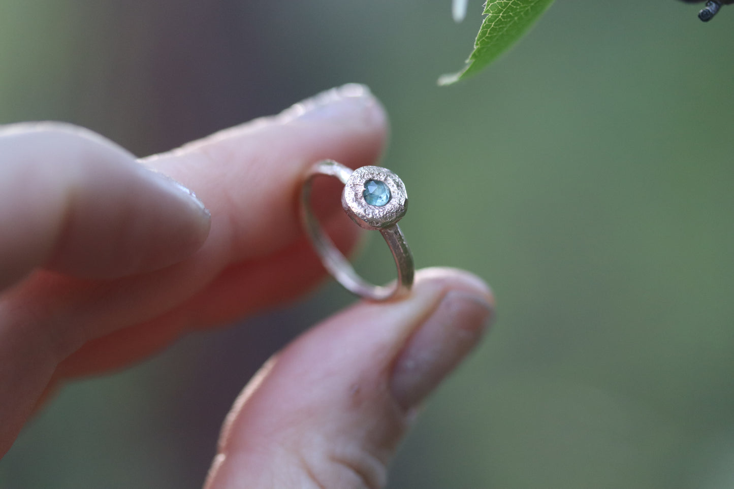 rustic organic sandcast solitaire ring alternative engagement 14kt recycled gold montana sapphire teal rosecut