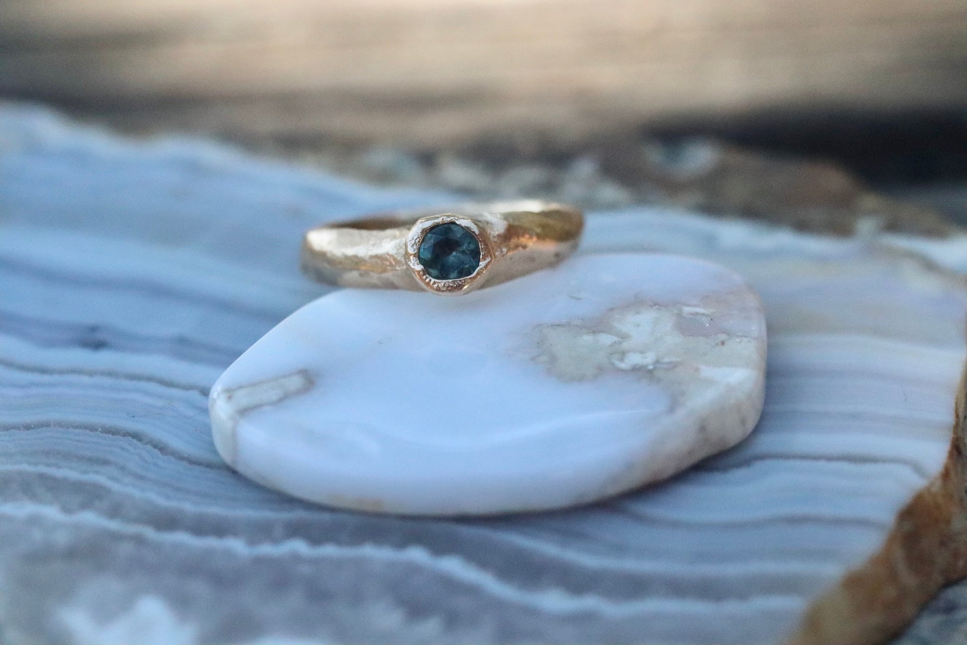 rustic organic sandcast solitaire ring alternative engagement 14kt recycled gold montana sapphire